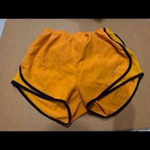 Nike orange running shorts